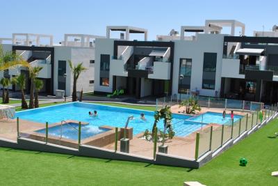 Jarðhæð íbúð í Oasis Beach Punta Prima 8 Nº 039 in España Casas