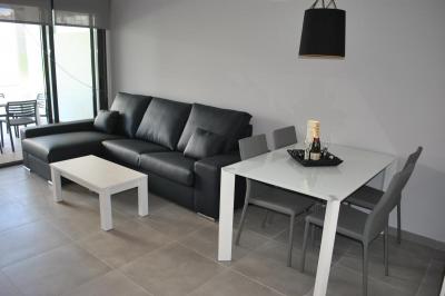 Apartamento en planta baja en Oasis Beach Punta Prima 8 Nº 035 in España Casas